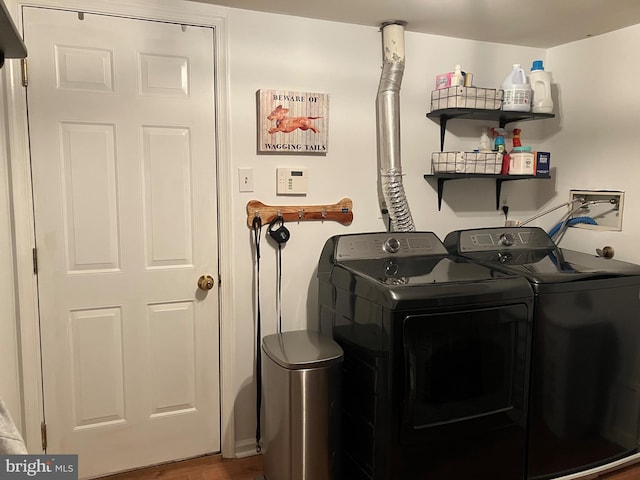 laundry area featuring independent washer and dryer