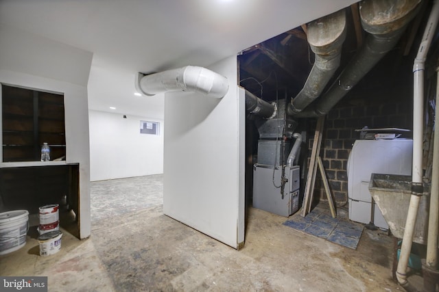 basement with water heater and heating unit