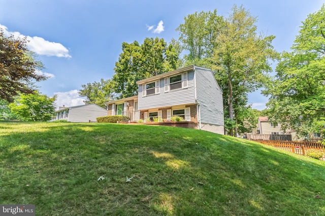 view of front of property with a front lawn