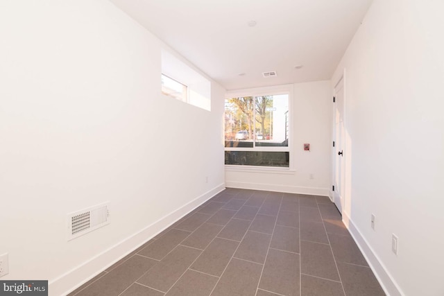 view of tiled spare room