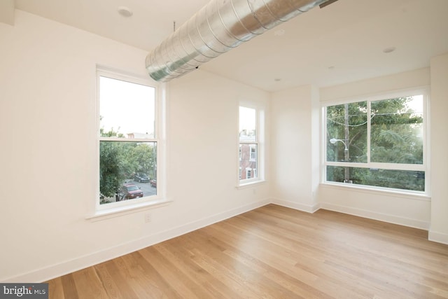 empty room featuring light hardwood / wood-style floors