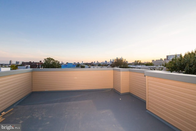 patio terrace at dusk with a balcony