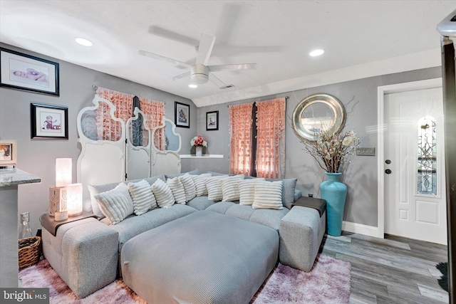 bedroom with hardwood / wood-style floors and ceiling fan