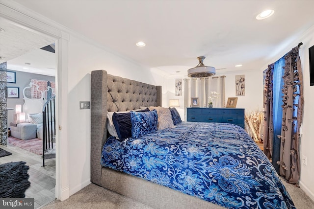 bedroom featuring carpet floors and crown molding