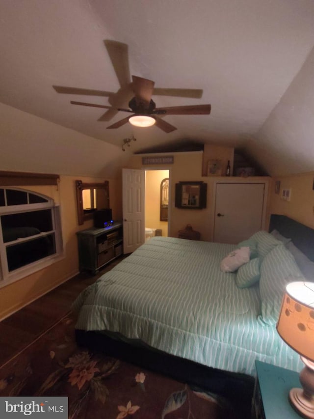 bedroom with vaulted ceiling and ceiling fan