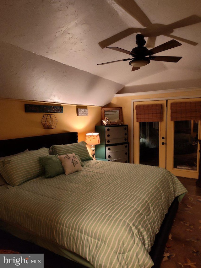 bedroom with vaulted ceiling and ceiling fan