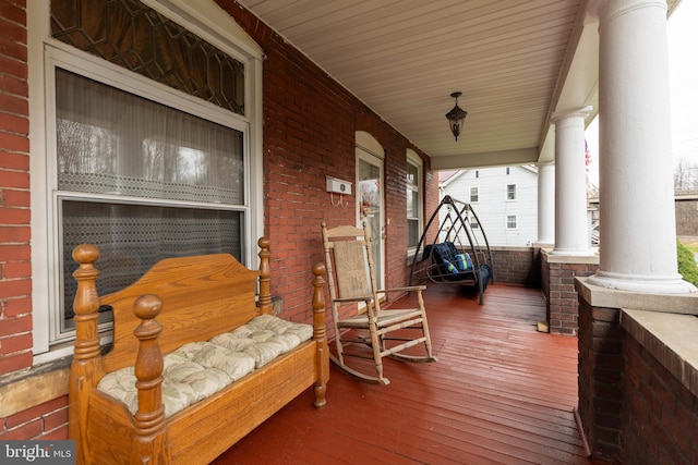 wooden terrace with covered porch