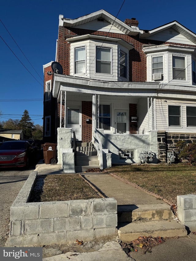 view of front of home featuring cooling unit