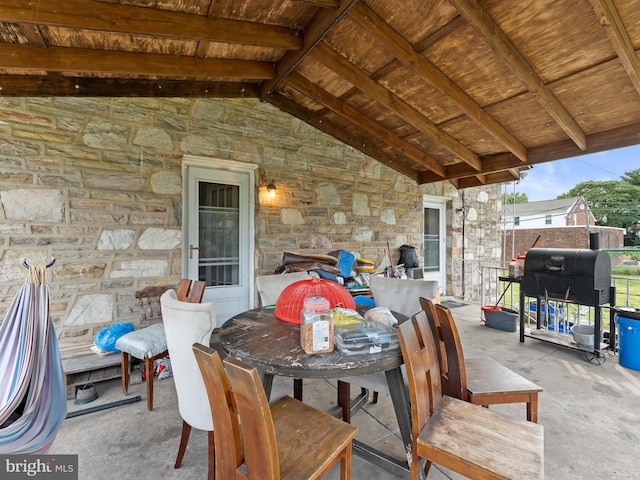 view of patio with a grill