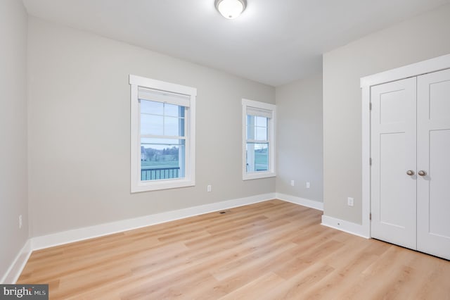 unfurnished bedroom featuring light hardwood / wood-style floors