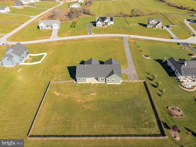 birds eye view of property featuring a rural view