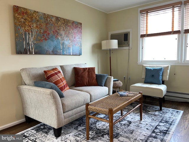 living room with hardwood / wood-style flooring, a healthy amount of sunlight, and a wall mounted air conditioner