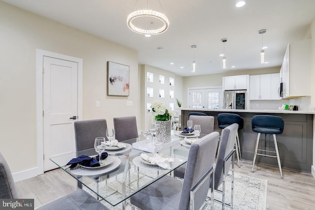 2405 Naylor Rd SE, Washington, DC 20020 - dining room with light wood-style floors, recessed lighting, and baseboards