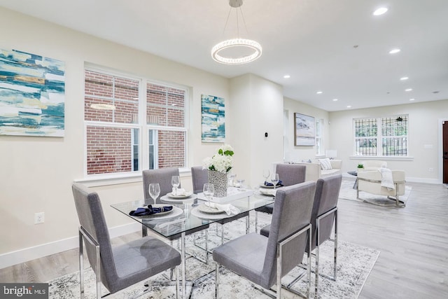 dining room with light wood-type flooring