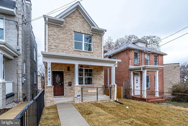 2405 Naylor Rd SE, Washington, DC 20020 - view of front facade with brick siding and covered porch