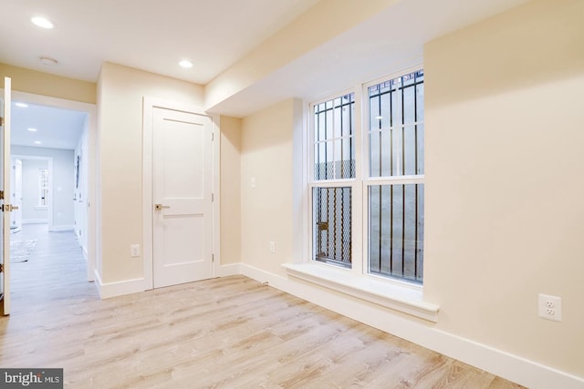 2405 Naylor Rd SE, Washington, DC 20020 - spare room with wood finished floors, baseboards, and recessed lighting