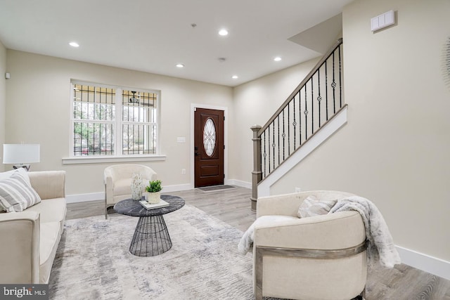 2405 Naylor Rd SE, Washington, DC 20020 - entrance foyer with wood finished floors, recessed lighting, baseboards, and stairs