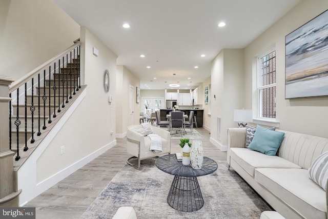 living room featuring light hardwood / wood-style flooring