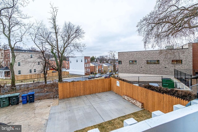 2405 Naylor Rd SE, Washington, DC 20020 - view of patio / terrace featuring fence and a residential view