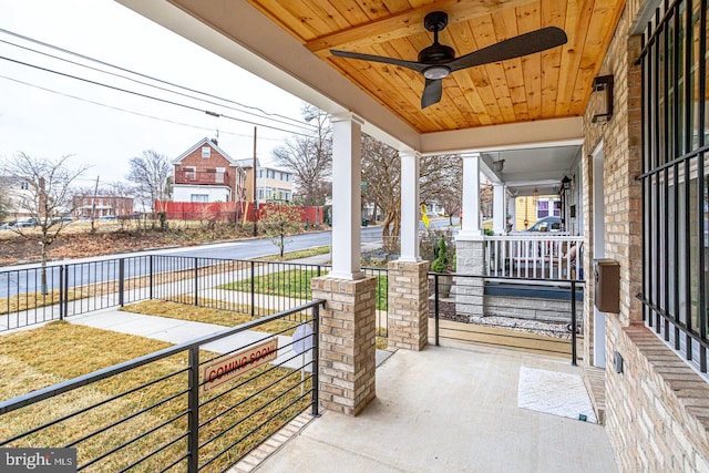 view of patio / terrace with a porch and ceiling fan