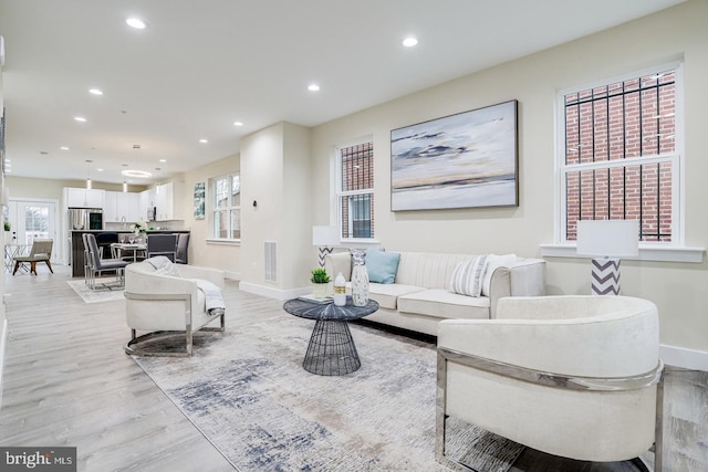 living room with light wood-type flooring