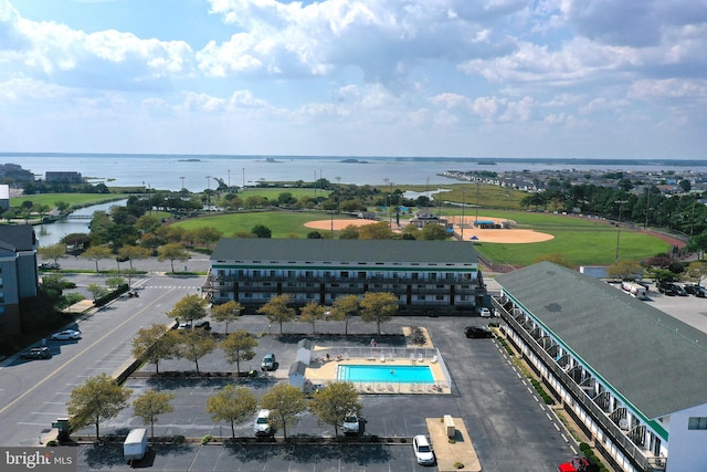 birds eye view of property featuring a water view