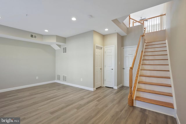 basement featuring light wood-type flooring