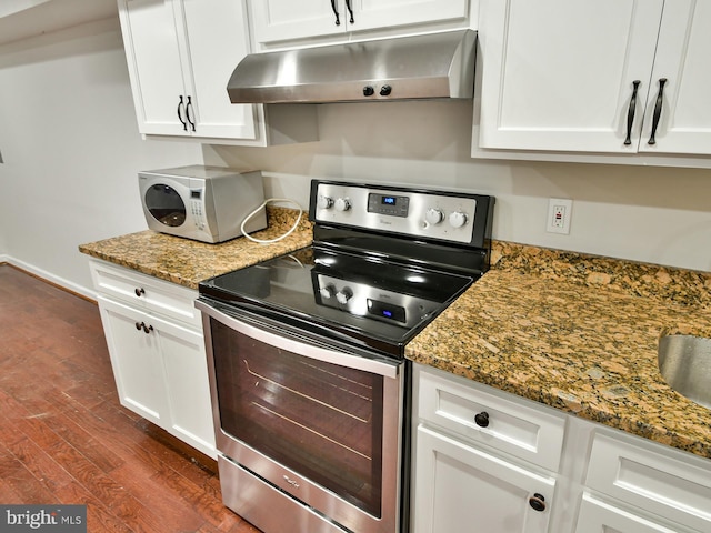 kitchen with white cabinets, stainless steel electric range, and dark wood-type flooring