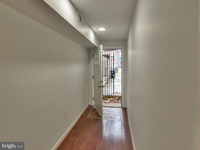 doorway to outside featuring dark hardwood / wood-style flooring