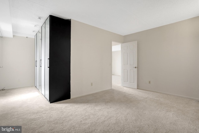 5911 Edsall Rd Unit 1107, Alexandria, VA 22304 - unfurnished room featuring carpet floors and baseboards