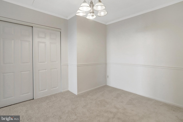 5911 Edsall Rd Unit 1107, Alexandria, VA 22304 - unfurnished bedroom with a chandelier, ornamental molding, carpet floors, a closet, and baseboards