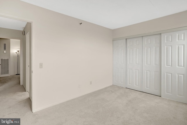 5911 Edsall Rd Unit 1107, Alexandria, VA 22304 - unfurnished bedroom with light carpet, a closet, and baseboards