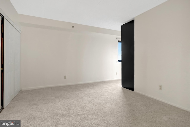 5911 Edsall Rd Unit 1107, Alexandria, VA 22304 - spare room featuring carpet and baseboards