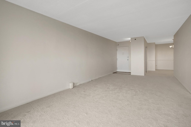 5911 Edsall Rd Unit 1107, Alexandria, VA 22304 - unfurnished room featuring light colored carpet and a chandelier