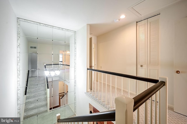 hallway featuring carpet floors