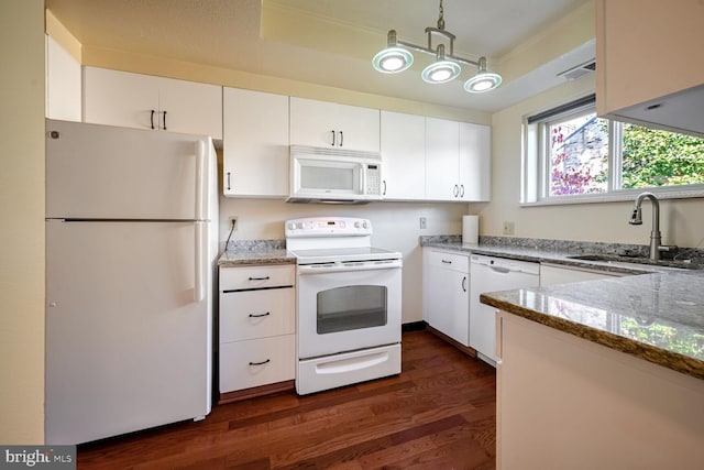 kitchen featuring white cabinets, dark hardwood / wood-style flooring, sink, and white appliances