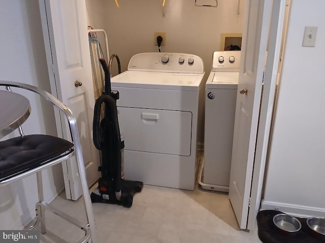 laundry room featuring washer and dryer