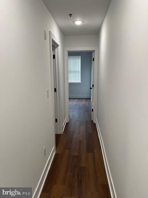 hall featuring dark hardwood / wood-style flooring