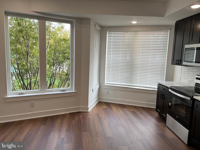 interior space with dark wood-type flooring