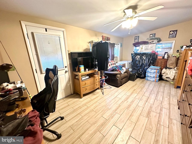 office featuring light wood-type flooring and ceiling fan