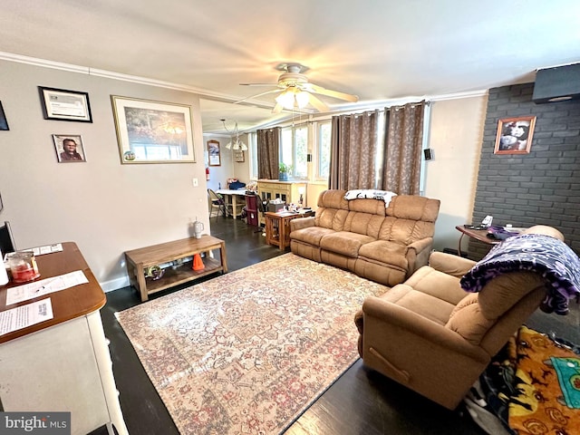 living room with dark wood-type flooring, ceiling fan, and crown molding