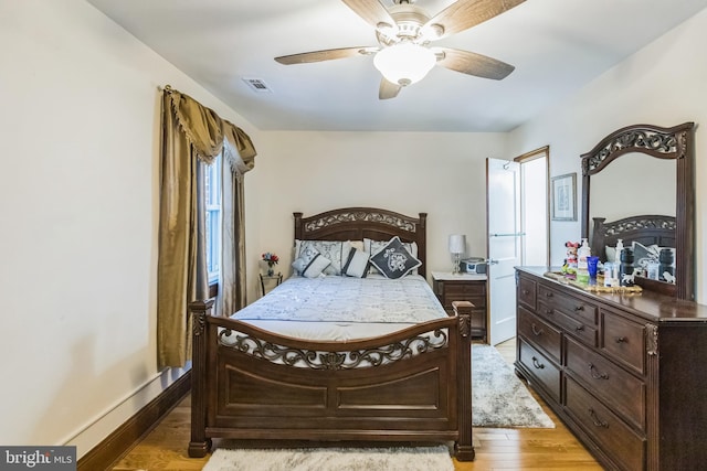 bedroom featuring ceiling fan and light wood-type flooring