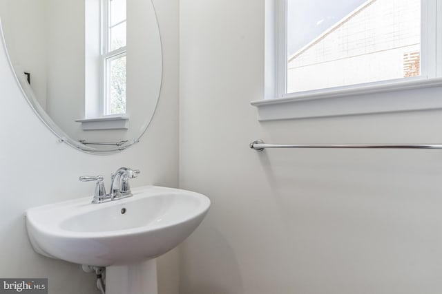 bathroom featuring sink and a healthy amount of sunlight