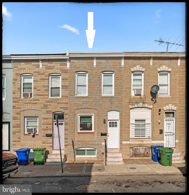 view of property featuring cooling unit