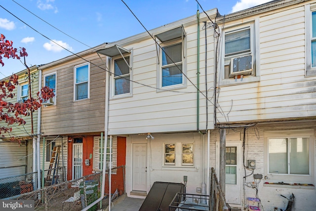 view of front of home with cooling unit