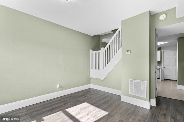 stairway with wood-type flooring