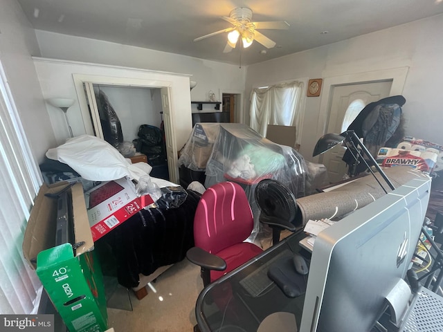 bedroom featuring ceiling fan and carpet floors