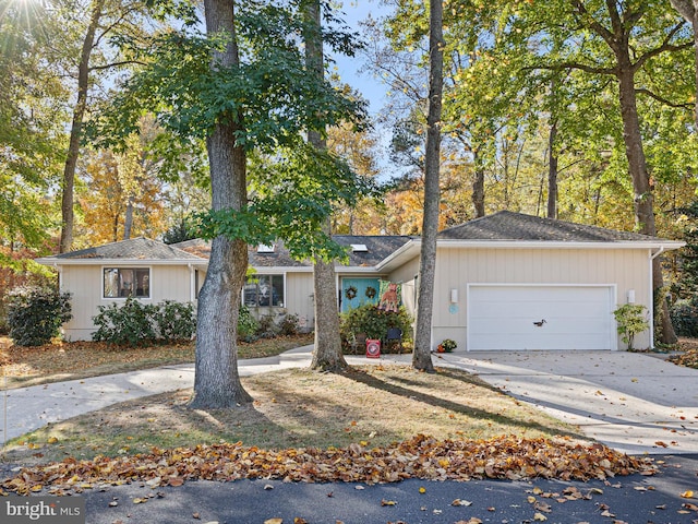 single story home featuring a garage