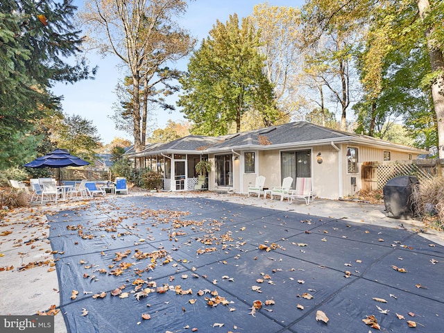 rear view of property with a patio