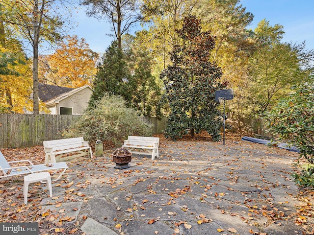 view of patio / terrace with an outdoor fire pit